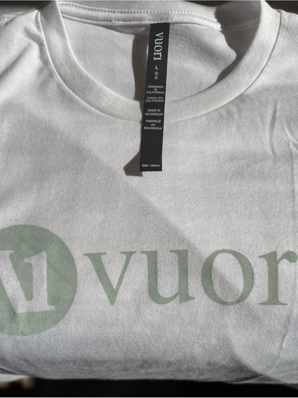 Vuori White Tee with Mint Green Logo - Picture 2 of 4
